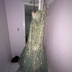 I am selling this dress because I know I won’t ever wear it again.